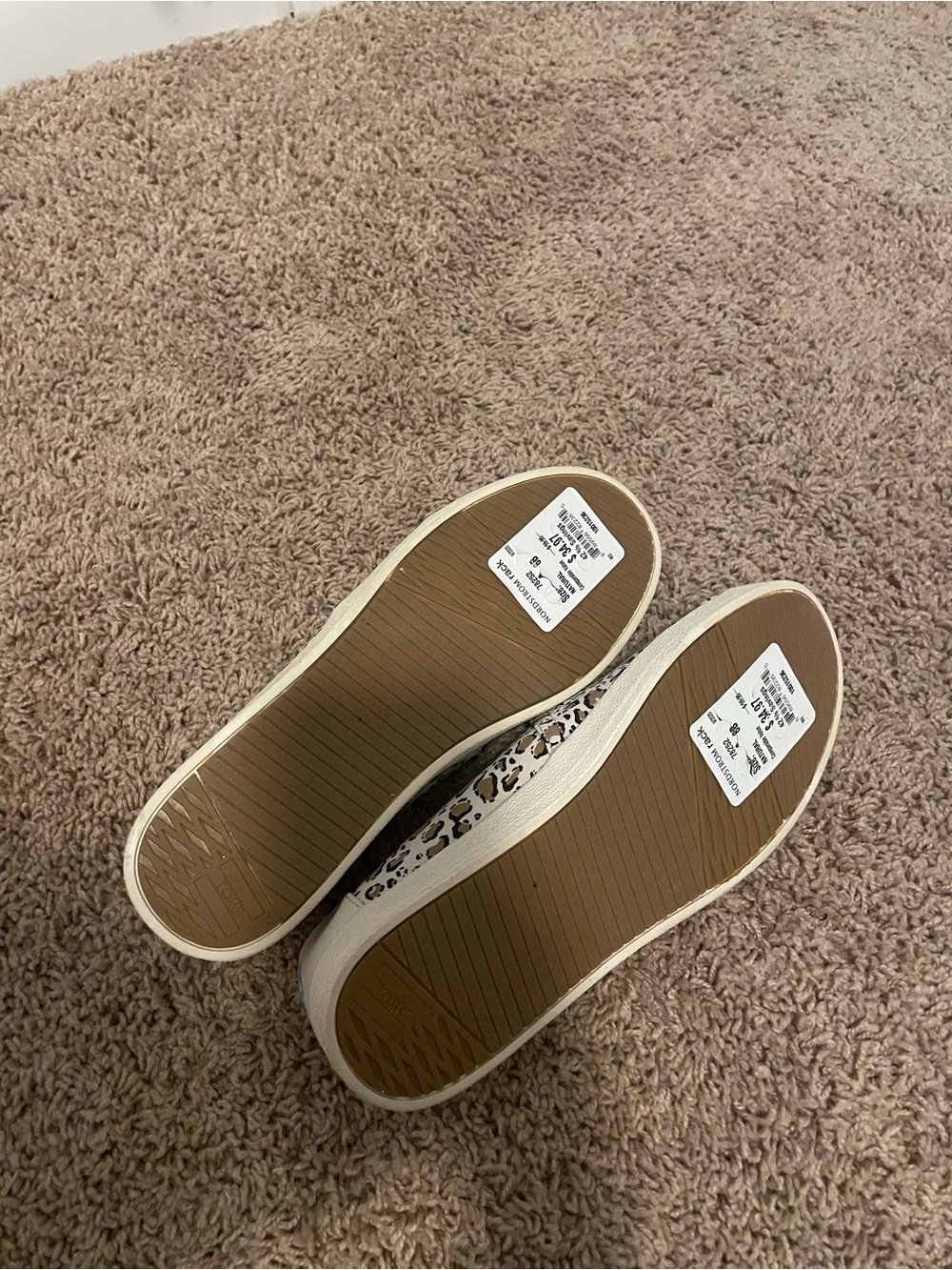TOMS Women’s Leopard Print Slip-On Flats in White, Tan, and Black - Picture 3 of 3